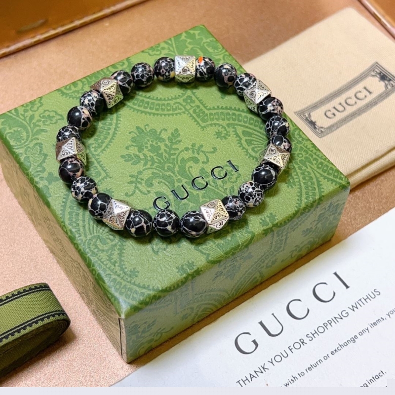 G*u*i bracelets